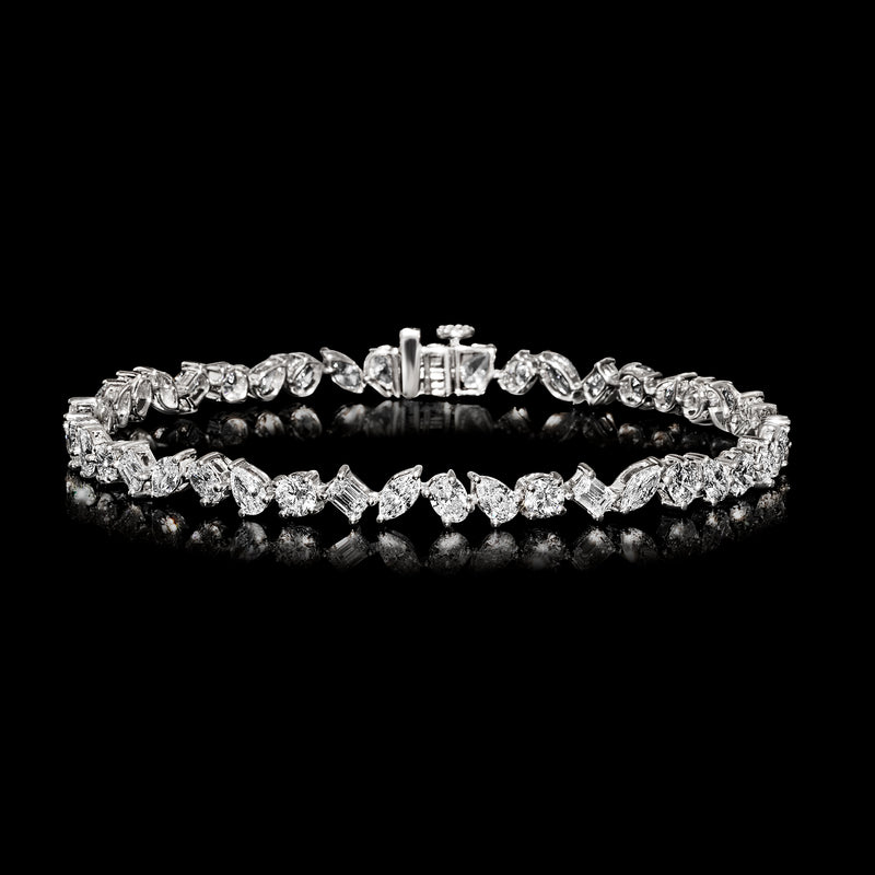 14kt white gold tennis bracelet with multi-shaped diamond row and box clasp