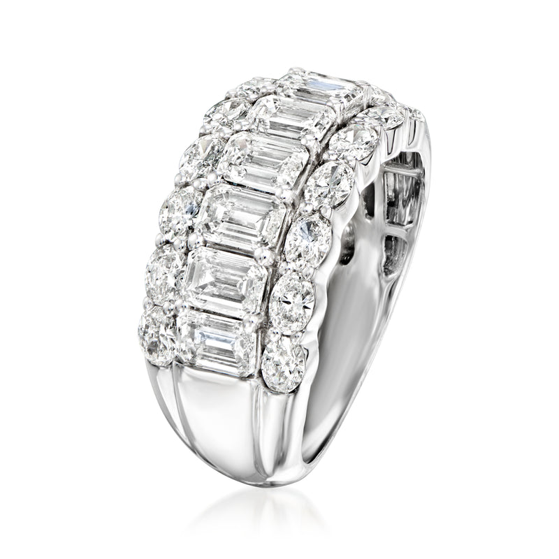 Three-row diamond ring side view with emerald-cut stones in 14kt white gold
