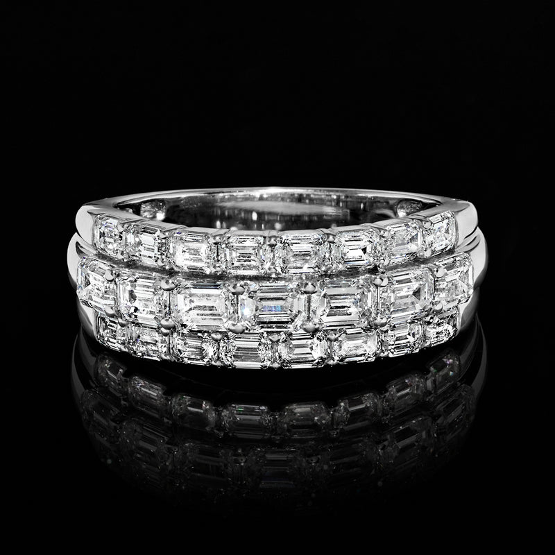 Three-row emerald-cut diamond ring with high-polish white gold band