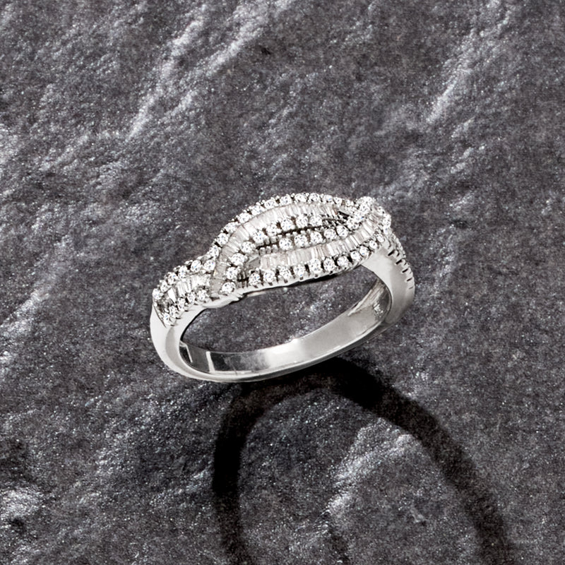 Sterling silver twisted diamond ring close-up showing baguette rows
