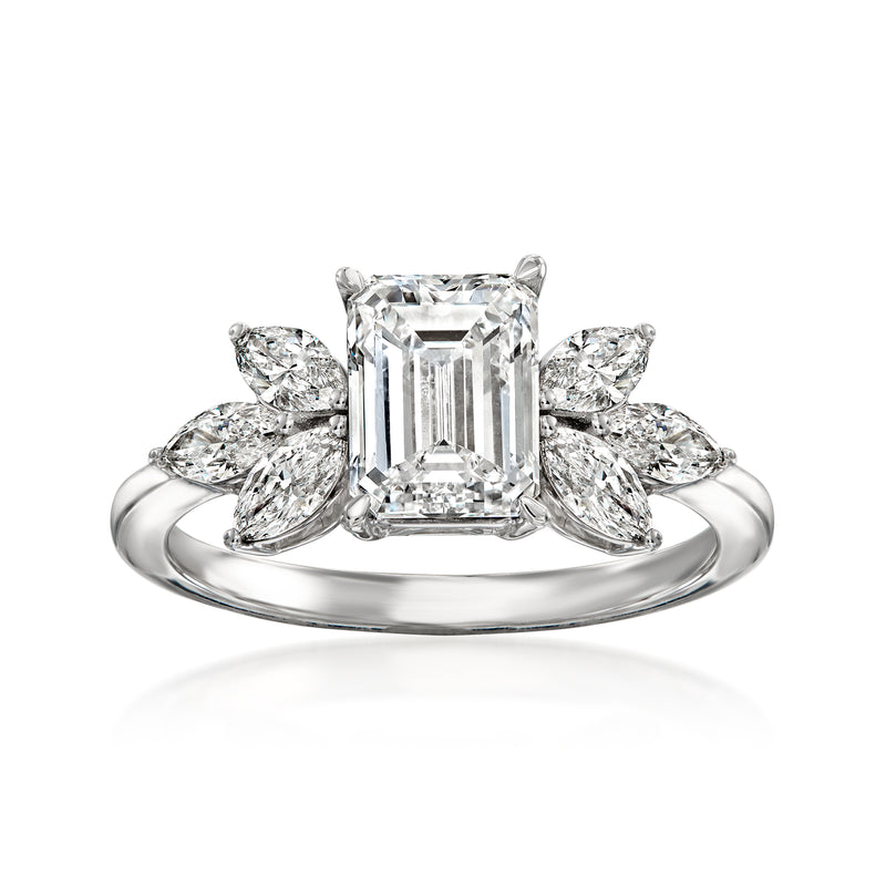 14kt white gold diamond ring with central emerald-cut and marquise side stones