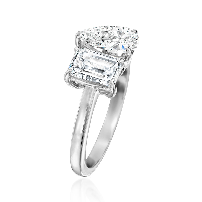 14kt white gold ring with pear-cut and emerald-cut diamonds, side view