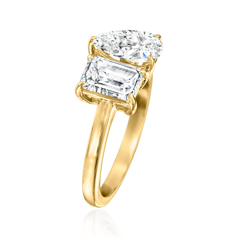 14kt yellow gold toi et moi ring with emerald-cut and pear-shaped diamond settings