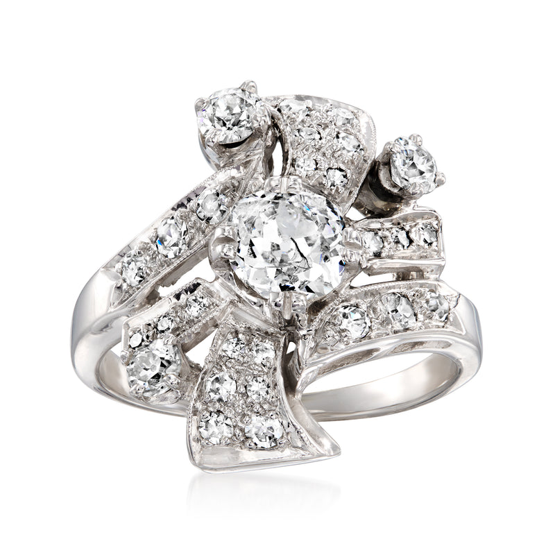 Vintage diamond cluster ring in 14kt white gold with round and baguette-cut stones