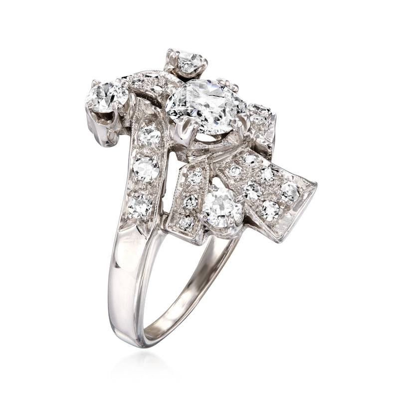 Diamond cluster ring with prong-set round center stone and geometric rectangular accents