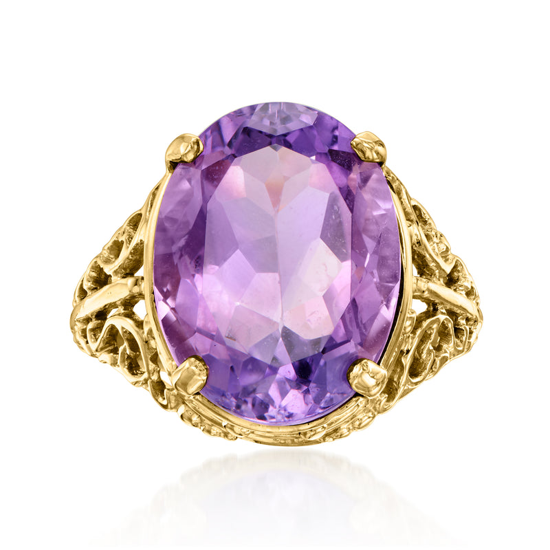 Vintage oval amethyst gemstone ring with gold filigree setting, round shoulders