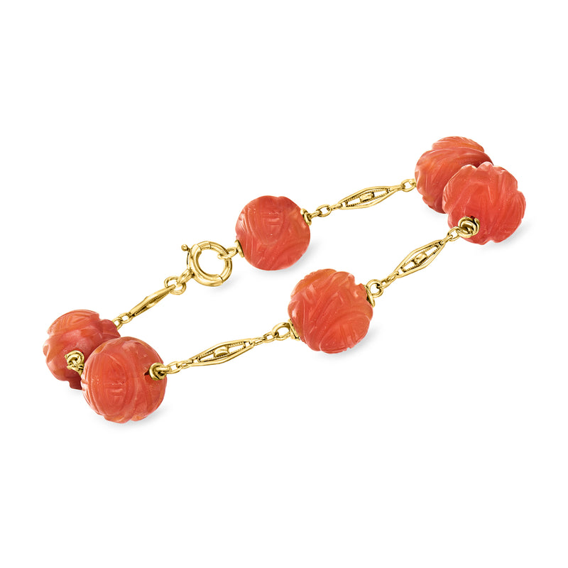 14kt yellow gold station bracelet with carved orange carnelian bead links