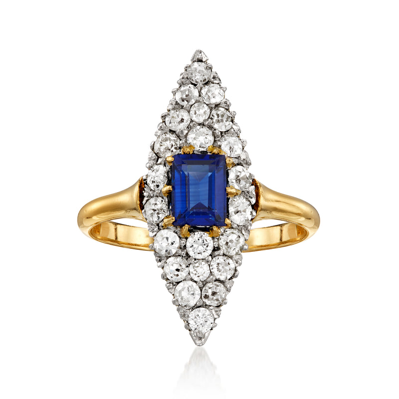 Vintage navette sapphire and diamond ring with yellow gold band and platinum setting