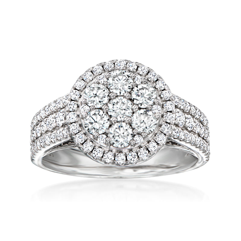 14kt white gold diamond cluster ring with round center stone and halo, pave sides