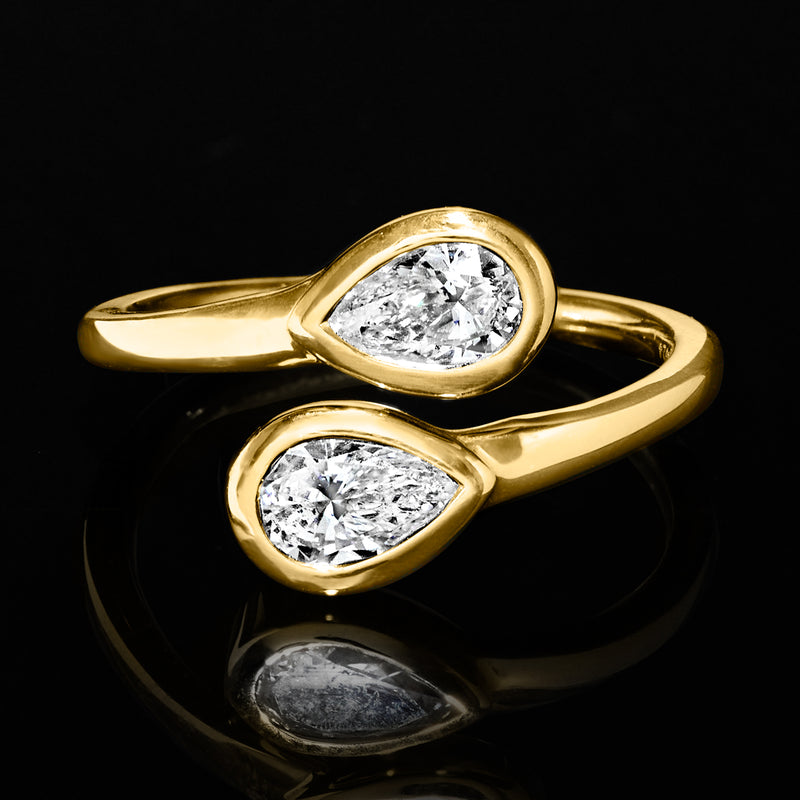 14kt yellow gold toi et moi bypass ring with two oval lab-grown diamonds, close-up