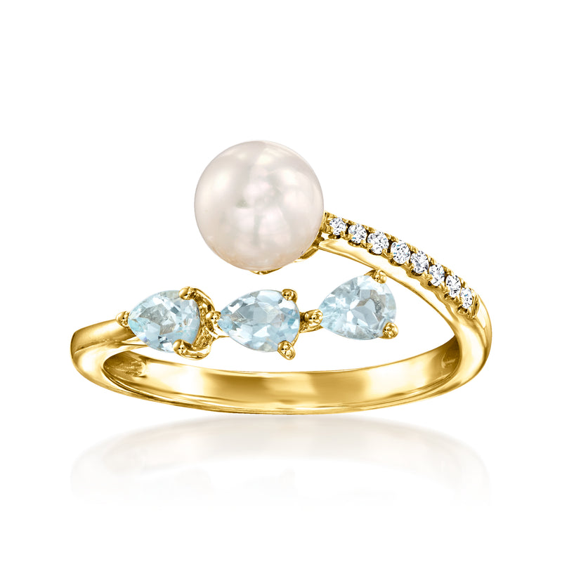 14kt yellow gold bypass ring with cultured pearl, three aquamarines, and diamond accents