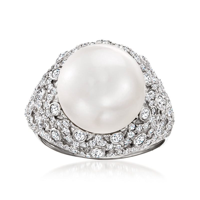 Sterling silver ring with a large cultured pearl and white topaz accents