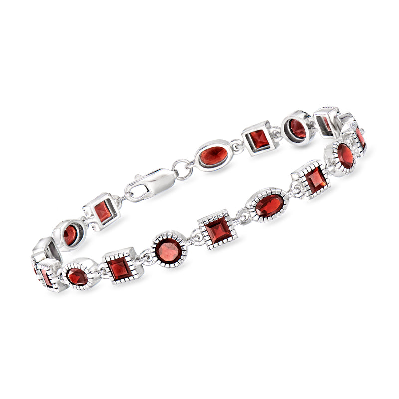 Sterling silver garnet bracelet with oval, square, and cushion red gemstones