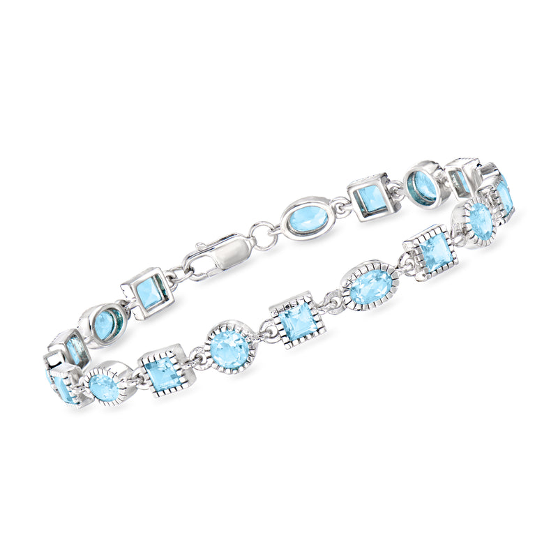 Sterling silver bracelet with sky-blue gemstones in oval, round, and square settings