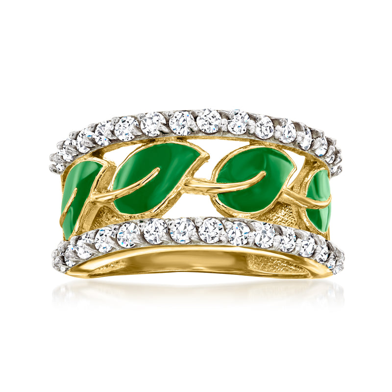 Gold-tone ring with green enamel leaf design and white gem stones across the band