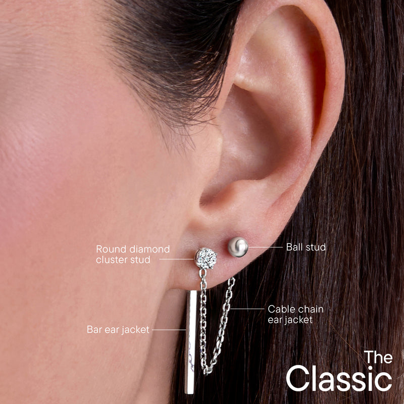 Sterling silver diamond earring set on ear: round cluster stud, cable chain jacket, bar drop