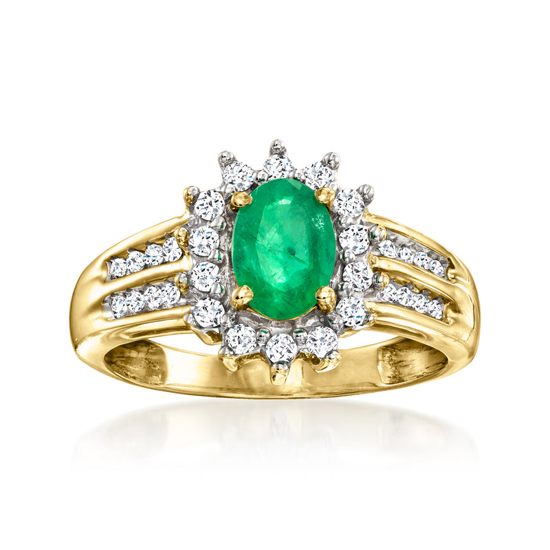 Vintage emerald and diamond ring in 14kt yellow gold, oval green center with halo