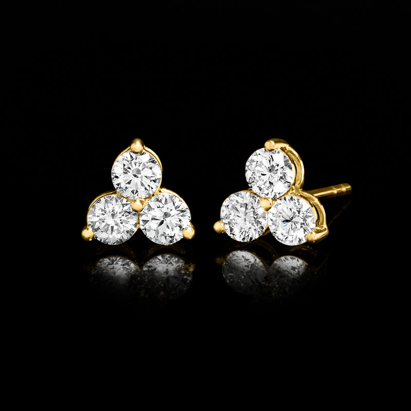 14kt yellow gold trio diamond post earrings, side view with three round stones