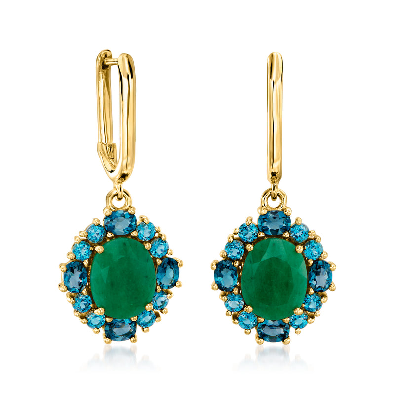 Gold drop earrings with oval green center stone and round blue accents in halo.