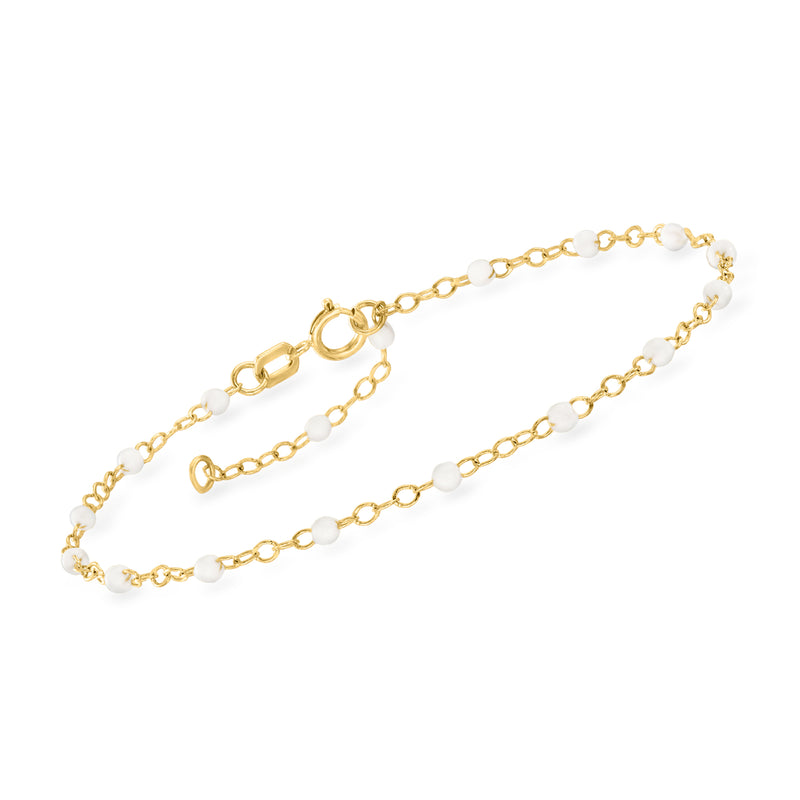 14kt yellow gold station bracelet with white enamel bead stations