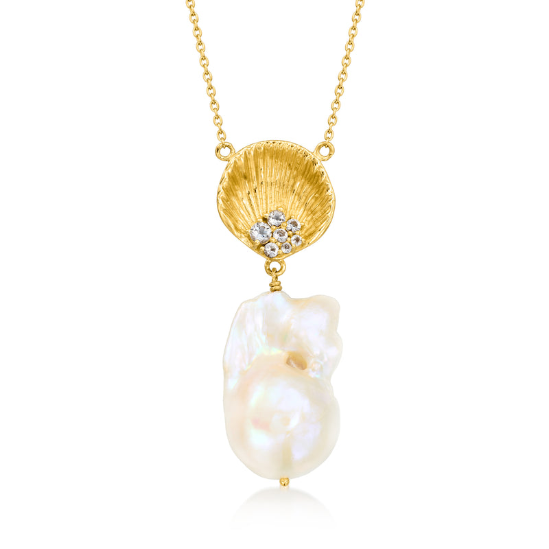 Gold-tone necklace with baroque white pearl and seashell pendant, small clear stones