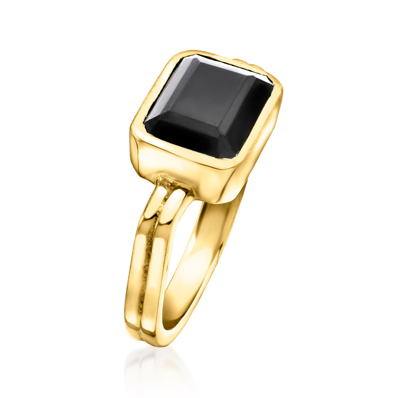 Gold over sterling ring with tilted square black onyx stone in raised bezel.