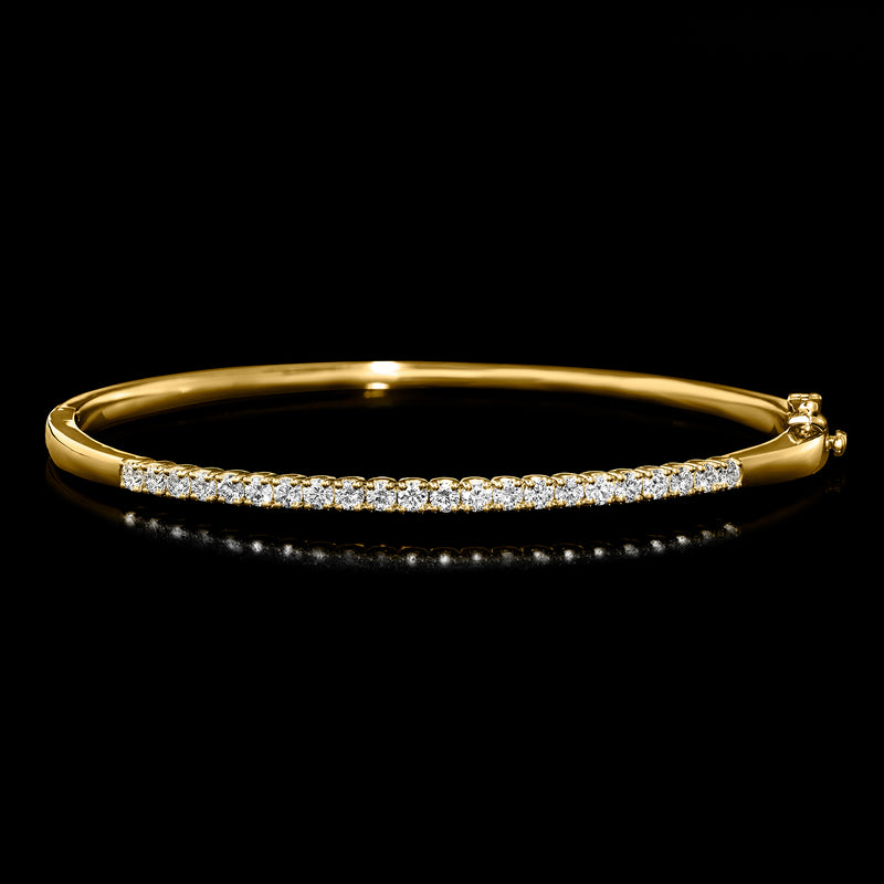 18kt gold over sterling diamond bangle bracelet with round stones and hinged clasp.