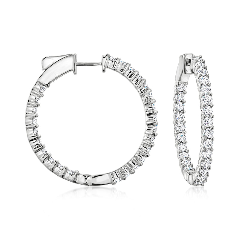 Sterling silver diamond hoop earrings with stones on inside and outside