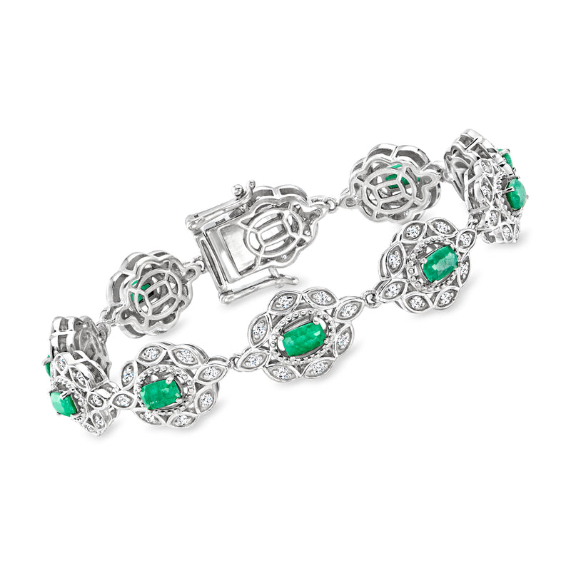 Sterling silver link bracelet with emerald and white topaz oval motifs