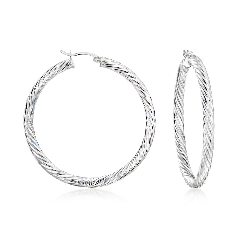Twisted sterling silver hoop earrings with twisted rope texture.