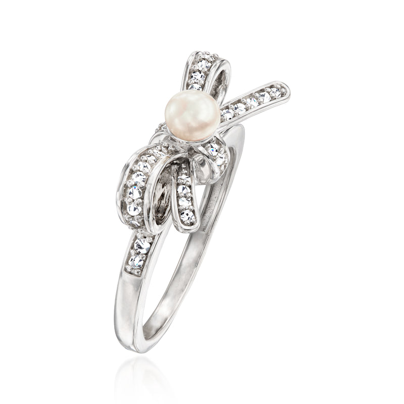 Sterling silver bow ring with round pearl and sparkling diamond-set details