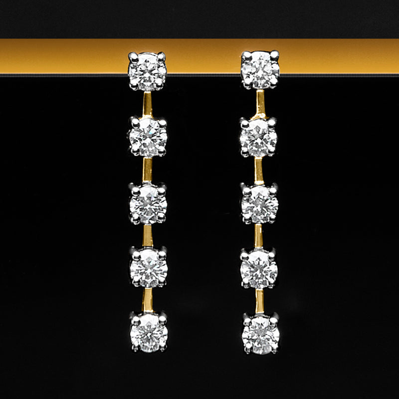 Linear diamond drop earrings with yellow gold posts and four stone segments each
