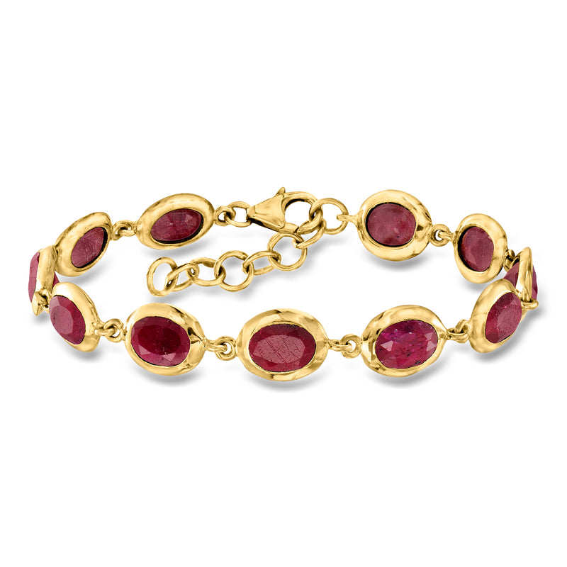 Gold over sterling ruby bracelet with oval red gemstones and linked chain