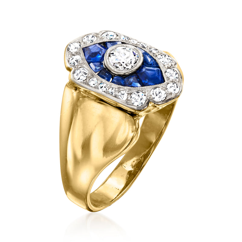 14kt yellow gold ring with blue sapphire center and surrounding round diamonds
