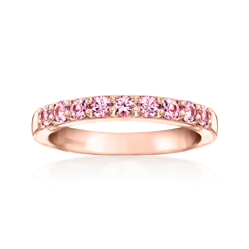 Pink sapphire eternity ring in rose gold with oval pink stones across the band