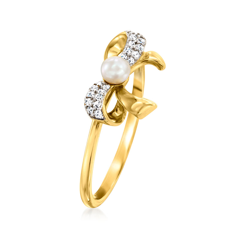 Pearl bow ring with diamonds in 14kt yellow gold