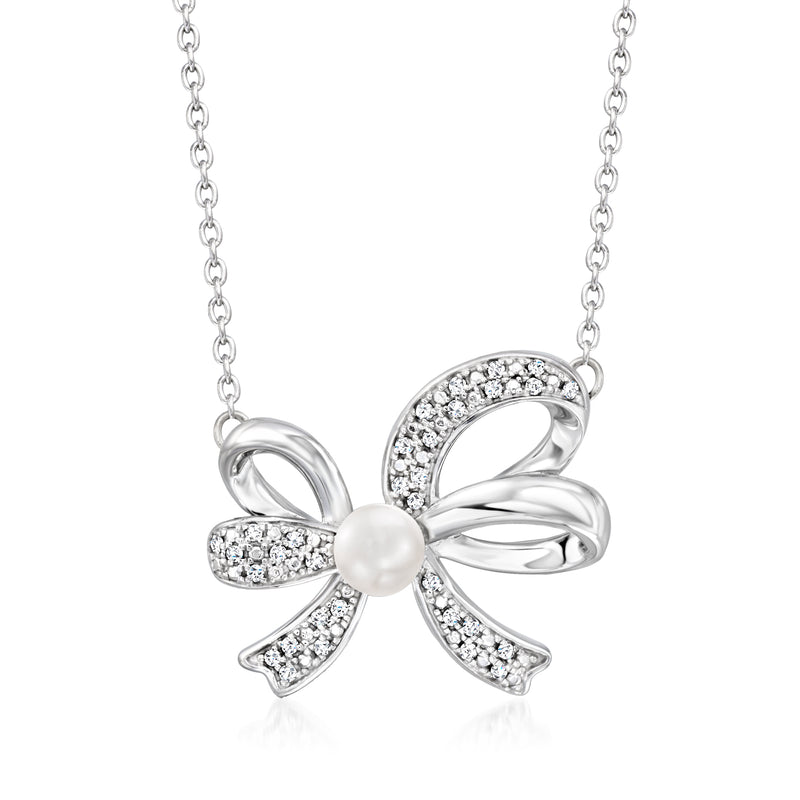 Sterling silver bow pendant necklace with round pearl and sparkling diamond accents