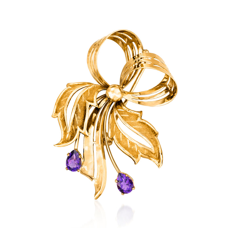 18kt yellow gold floral bow pin with purple amethyst stones and dangling drops