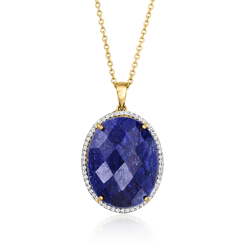 Gold pendant necklace with oval blue sapphire and white topaz halo on chain