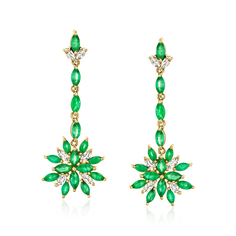 Gold drop earrings with green oval stones and flower cluster with white sparkle accents