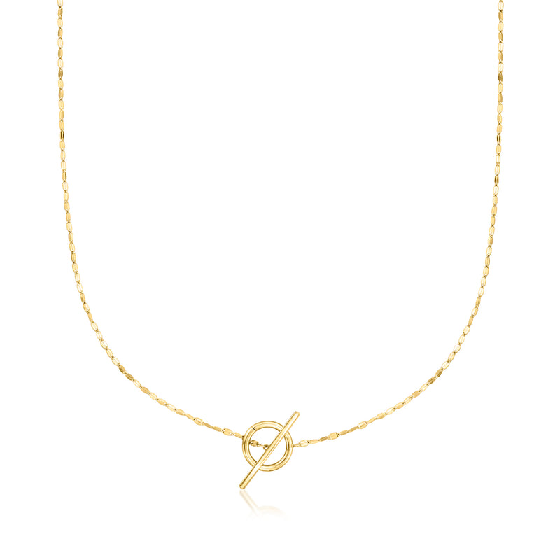 Yellow gold chain necklace with circular toggle clasp at the center