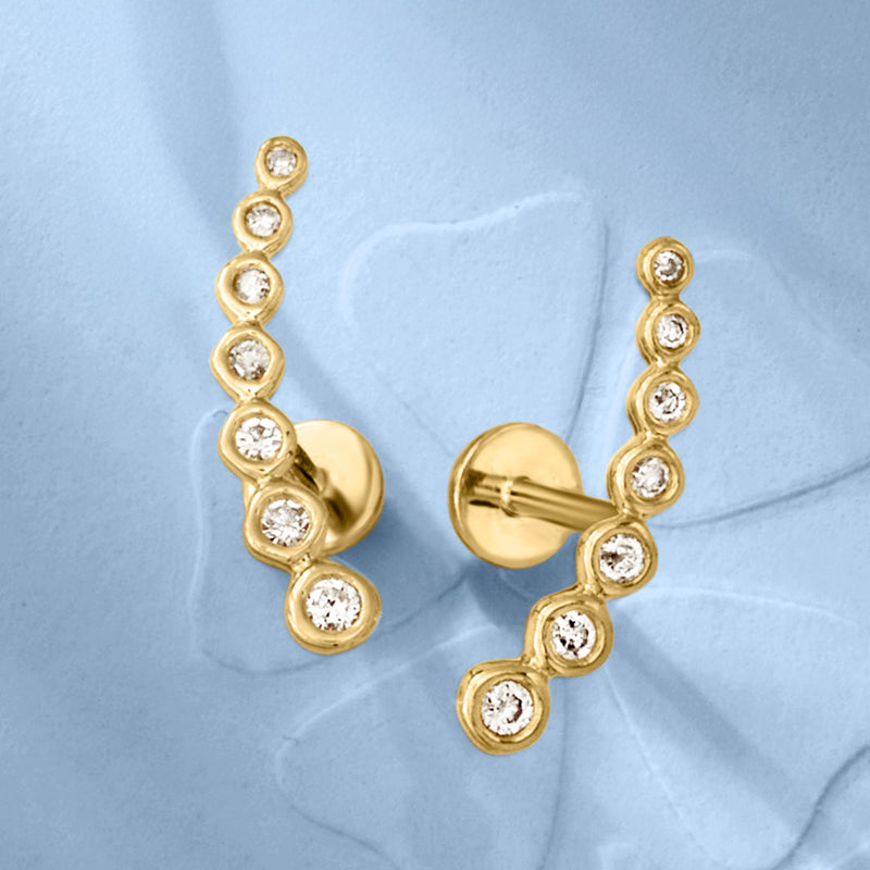14kt yellow gold diamond curved ear climber with flat-back setting and five stones