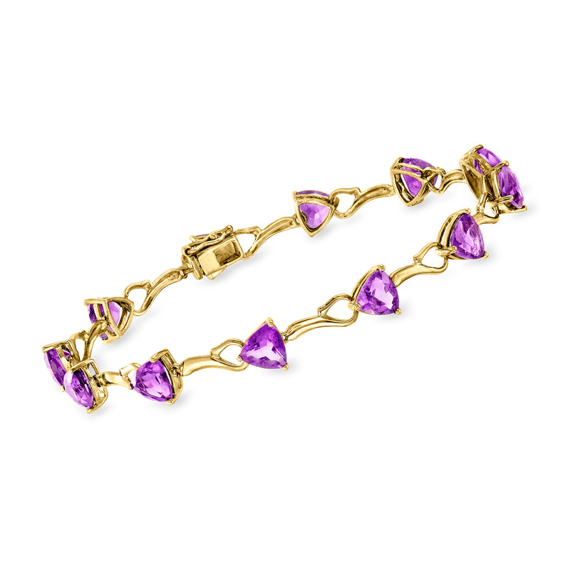 Amethyst link bracelet in yellow gold with purple teardrop stones, vintage style.