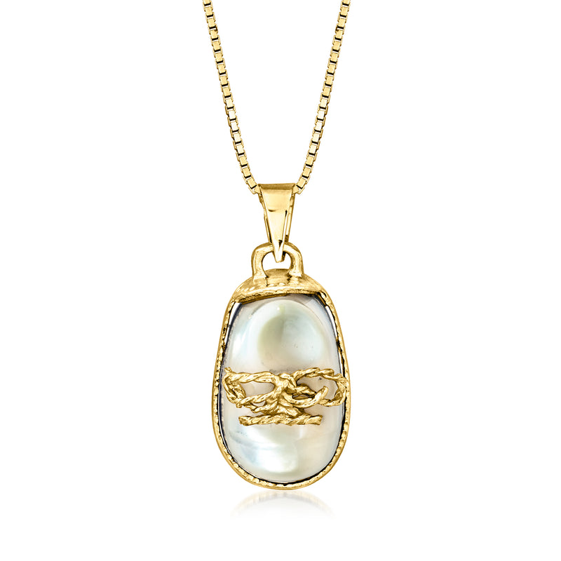 14kt yellow gold baby shoe pendant necklace with mother-of-pearl oval pendant