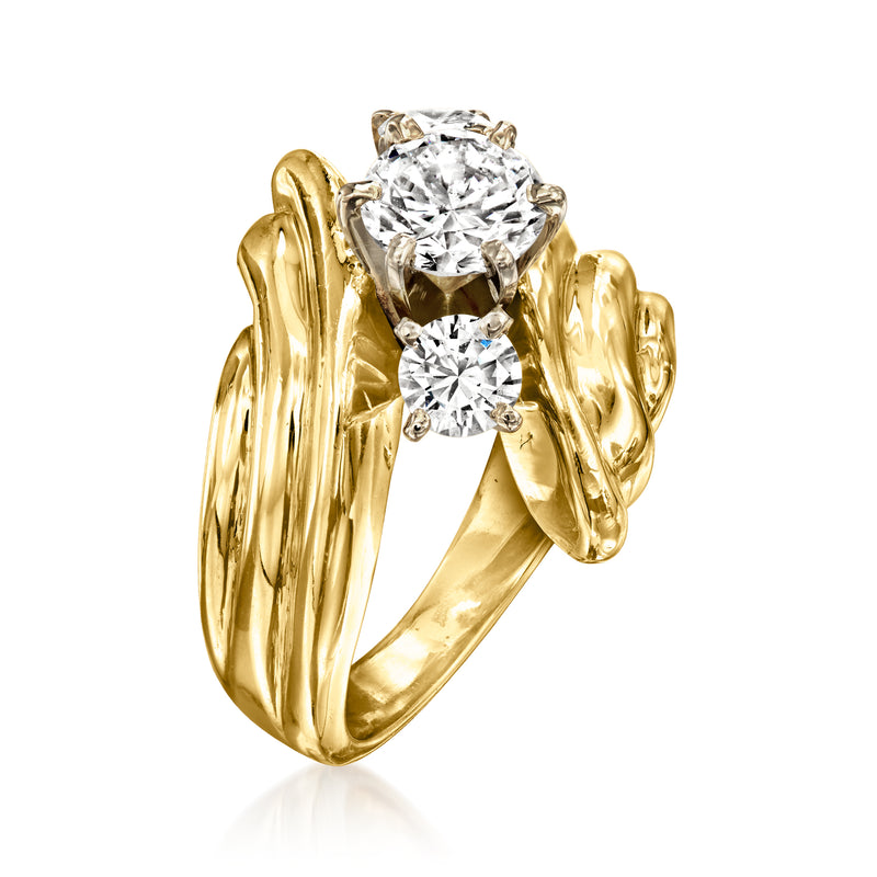 Yellow gold bypass ring with large round center diamond and two round side diamonds