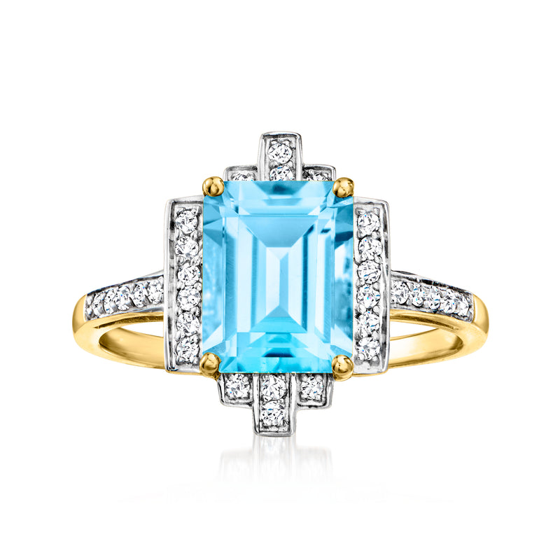 14kt yellow gold ring with emerald-cut blue topaz and diamond halo