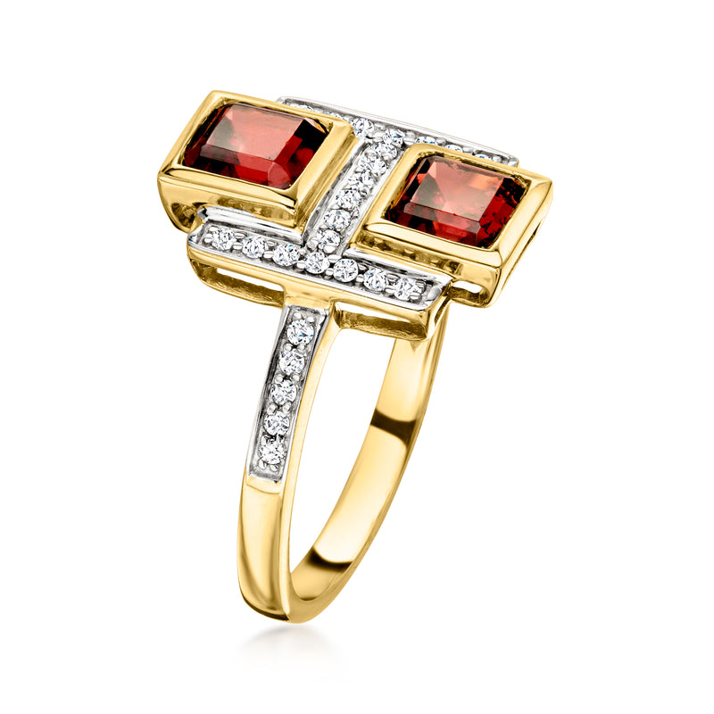 Yellow gold ring with two square red garnets and diamond halo accents