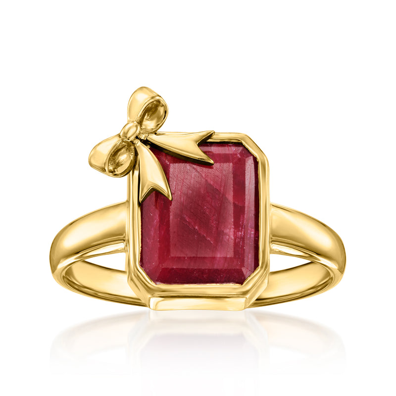 Gold bow ring with square red gemstone centerpiece