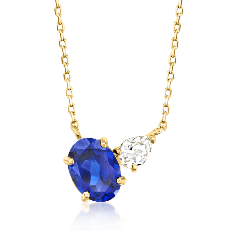 14kt yellow gold toi et moi necklace with oval blue and white sapphire stones