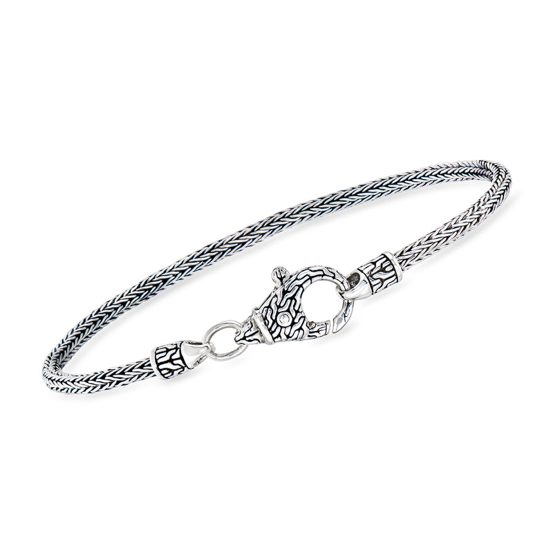 Silver wheat-chain bracelet with lobster clasp and engraved connector
